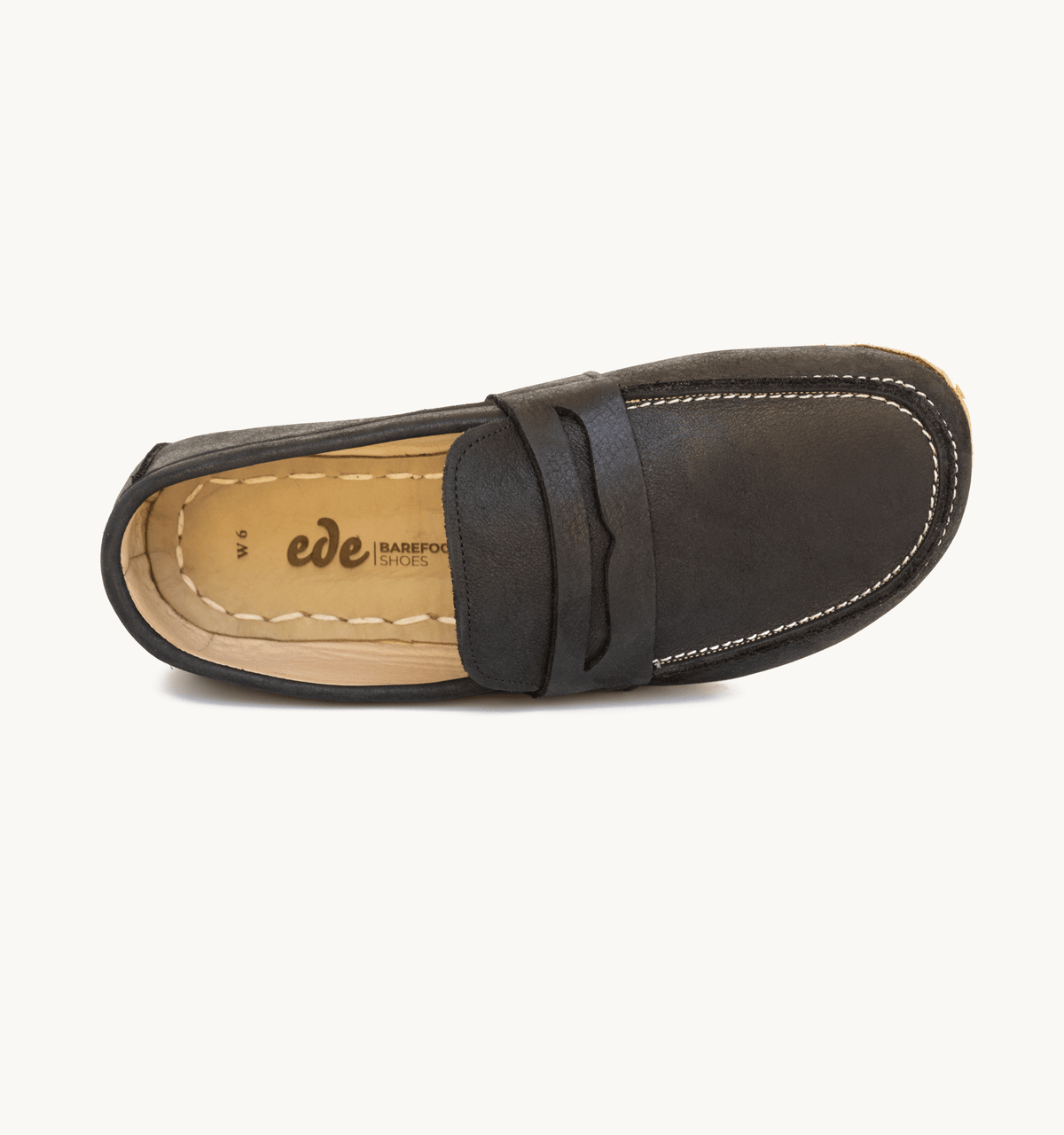 Raven Black men's barefoot leather penny loafer, side view — hand-stitched, zero drop