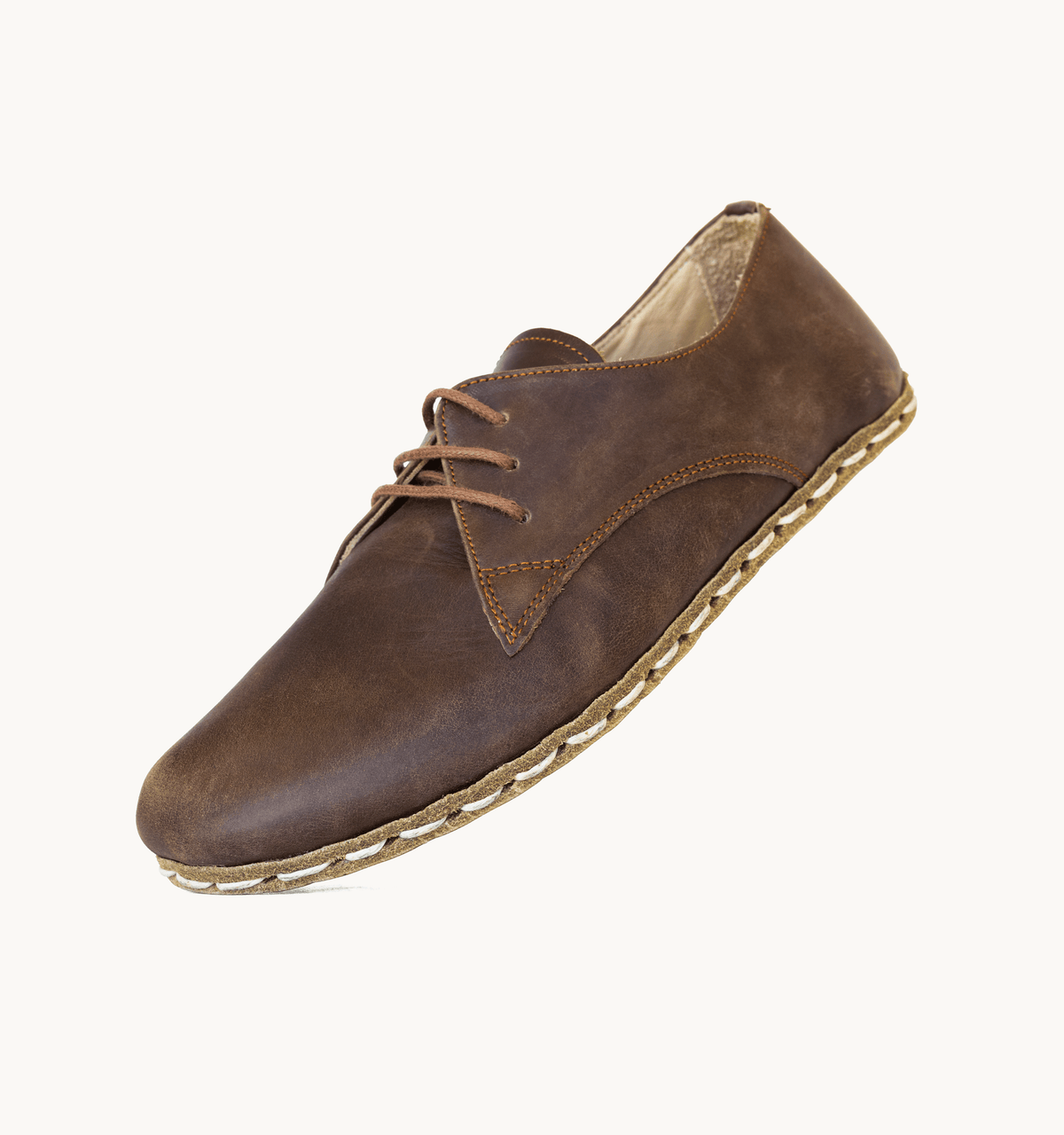 Earth men's barefoot leather oxford, side view — hand-stitched, zero drop
