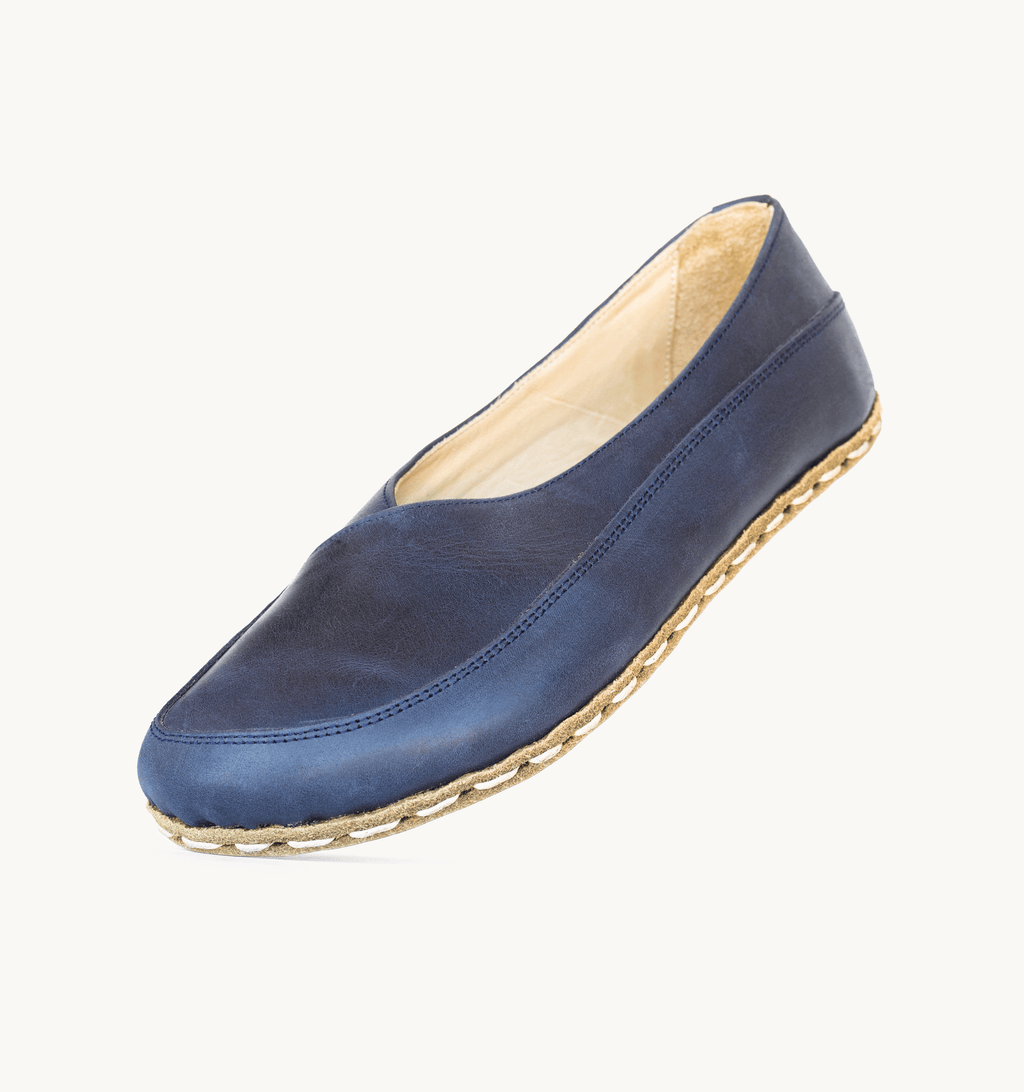Ocean women's barefoot leather flat, side view — hand-stitched, zero drop