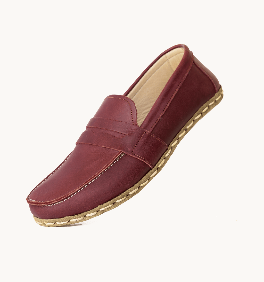 Burgundy women's barefoot penny loafer — smooth full-grain calfskin upper, hand-cut