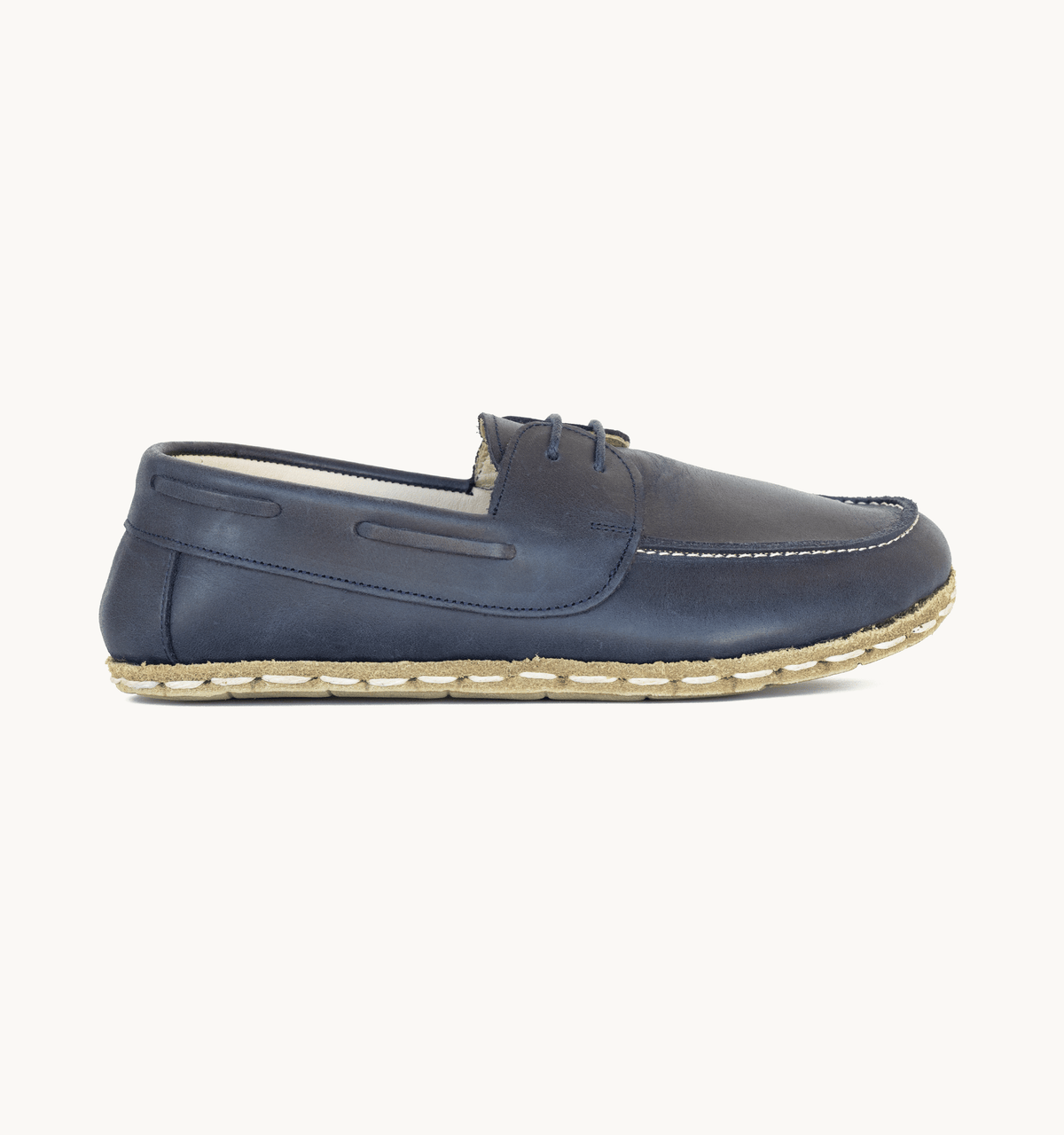 Ocean women's barefoot leather boat shoe, side view — hand-stitched, zero drop