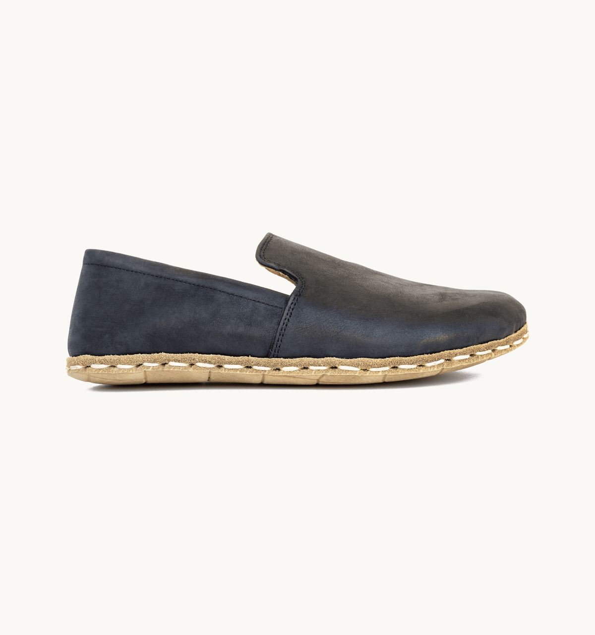 Raven Black men's barefoot leather loafer, side view — hand-stitched, zero drop