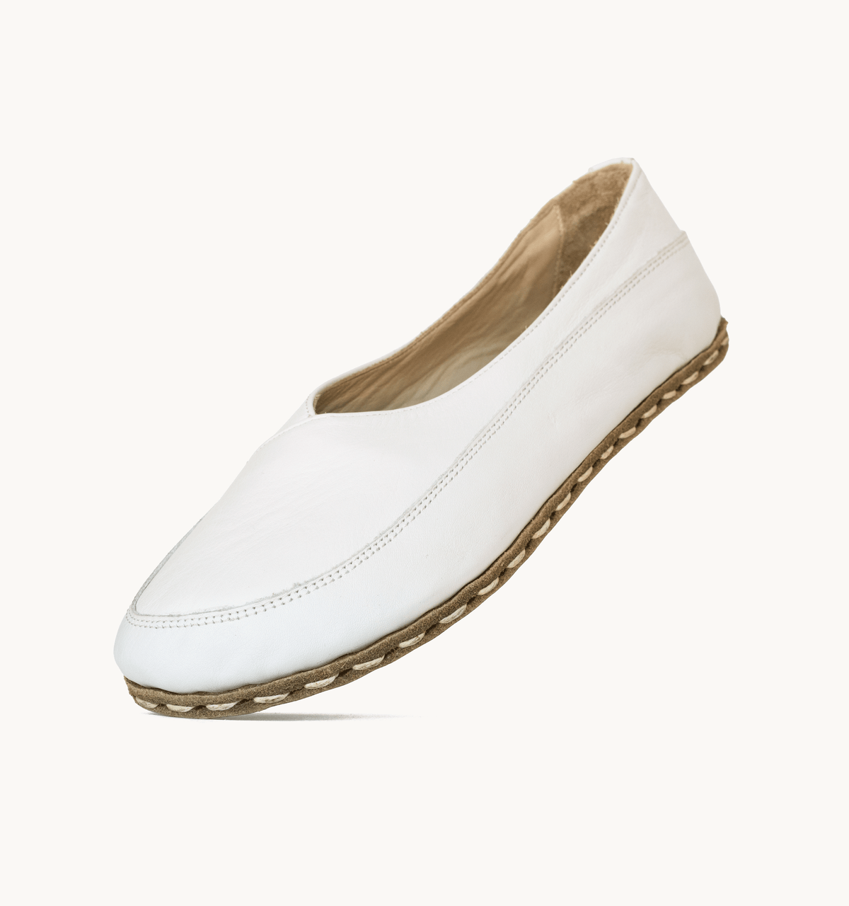 Cloud women's barefoot leather flat, side view — hand-stitched, zero drop