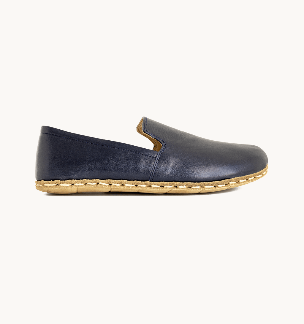 Indigo men's barefoot leather loafer, side view — hand-stitched, zero drop