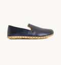 Indigo men's barefoot leather loafer, side view — hand-stitched, zero drop