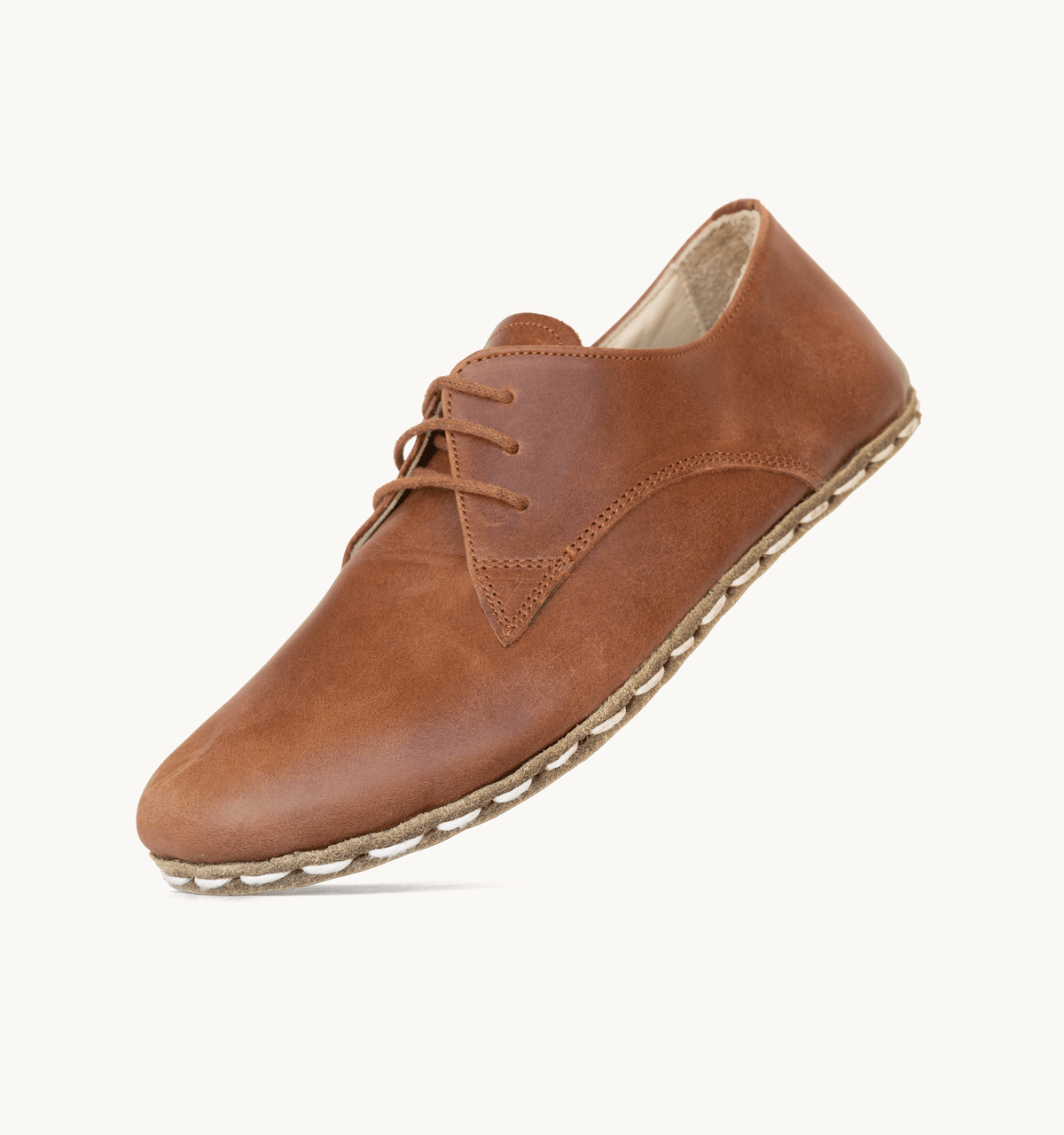 Umber women's barefoot leather oxford, side view — hand-stitched, zero drop