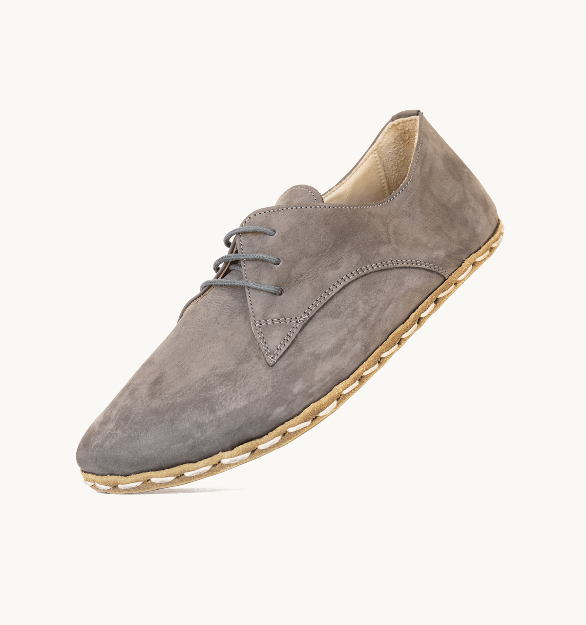 Ashen men's barefoot leather oxford, side view — hand-stitched, zero drop