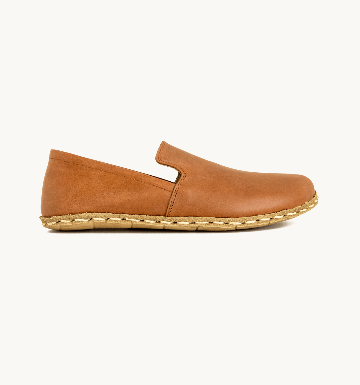Umber men's barefoot leather loafer, side view — hand-stitched, zero drop