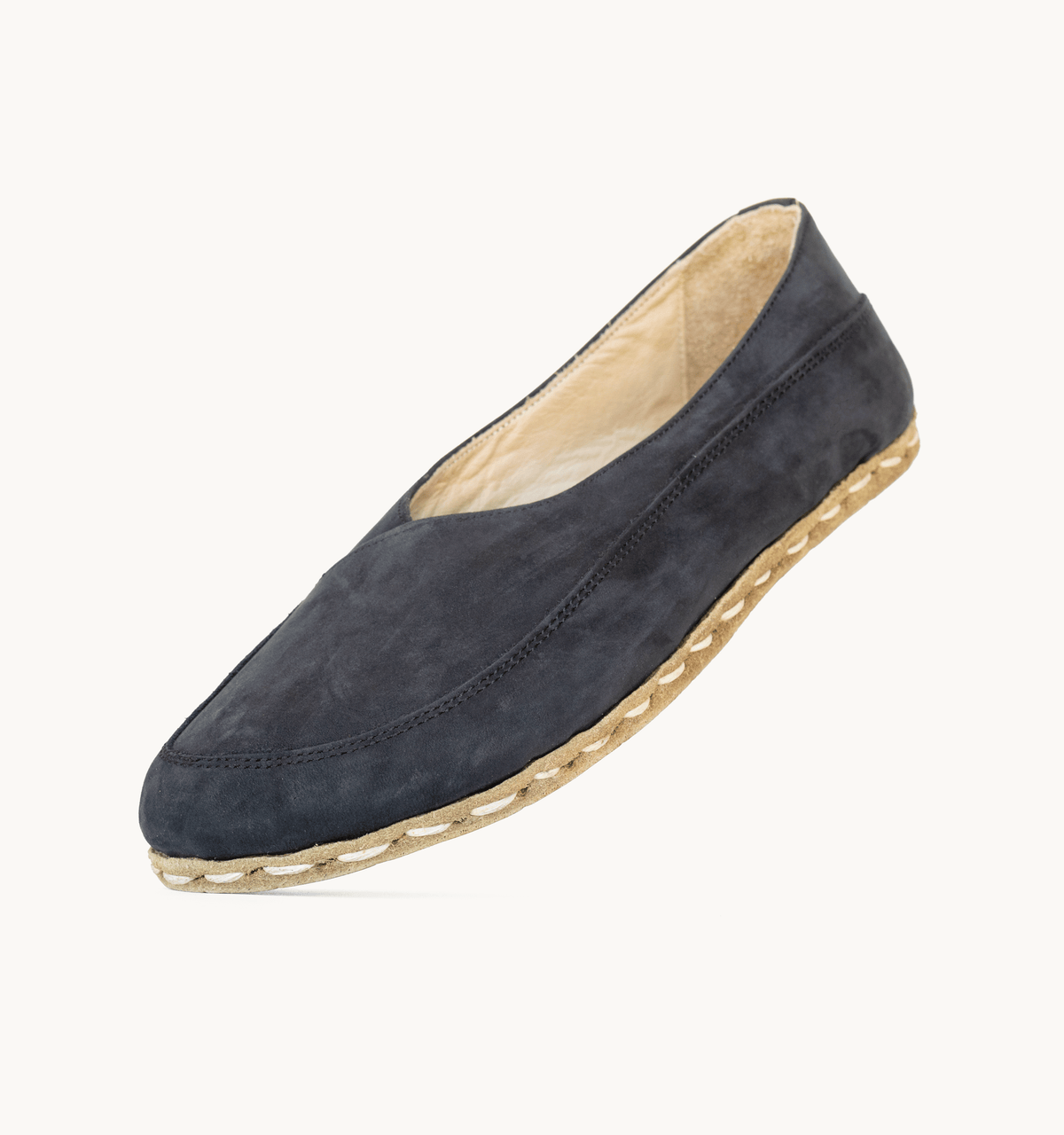 Midnight women's barefoot leather flat, side view — hand-stitched, zero drop