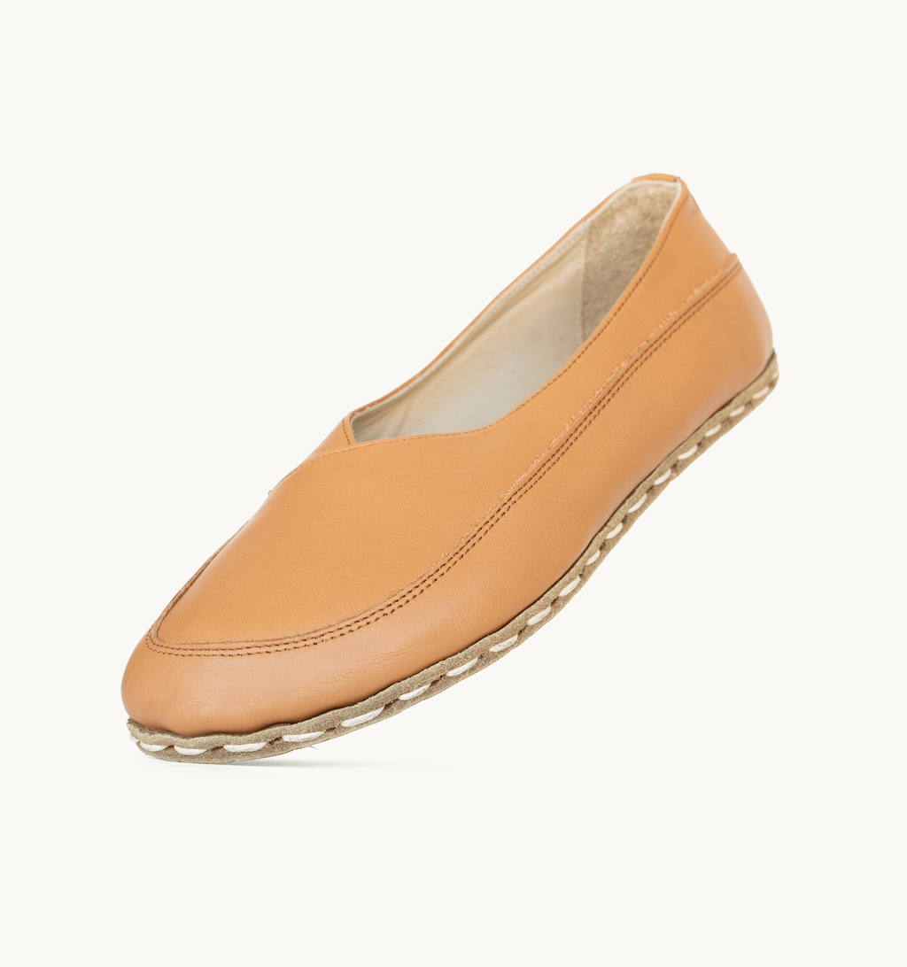 Sunset women's barefoot leather flat, side view — hand-stitched, zero drop