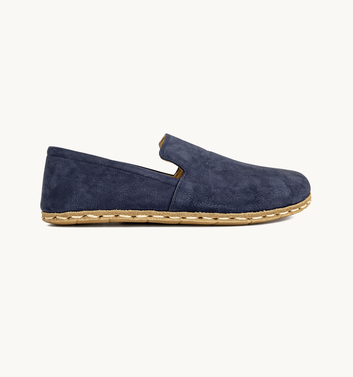 Navy men's barefoot leather loafer, side view — hand-stitched, zero drop