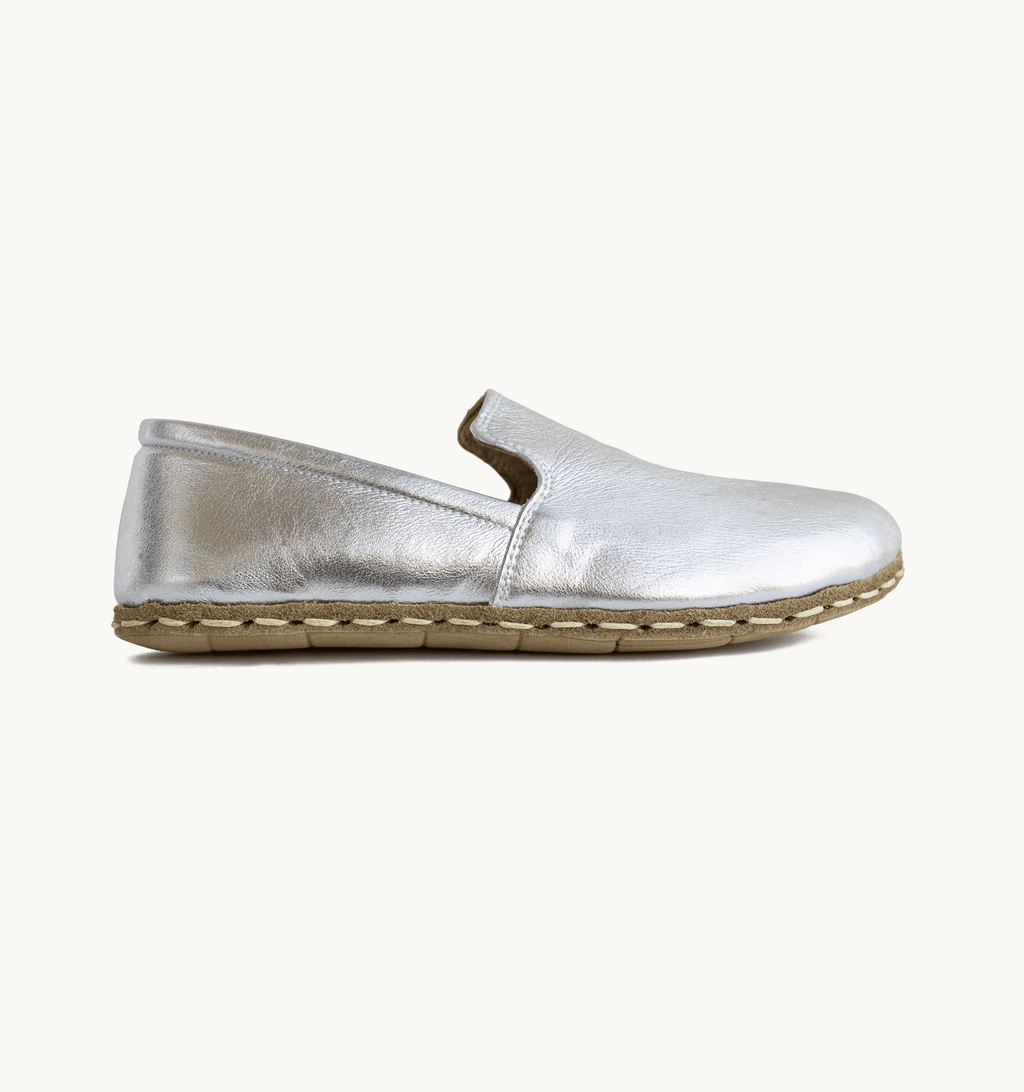 Moonlight women's barefoot leather loafer, side view — hand-stitched, zero drop