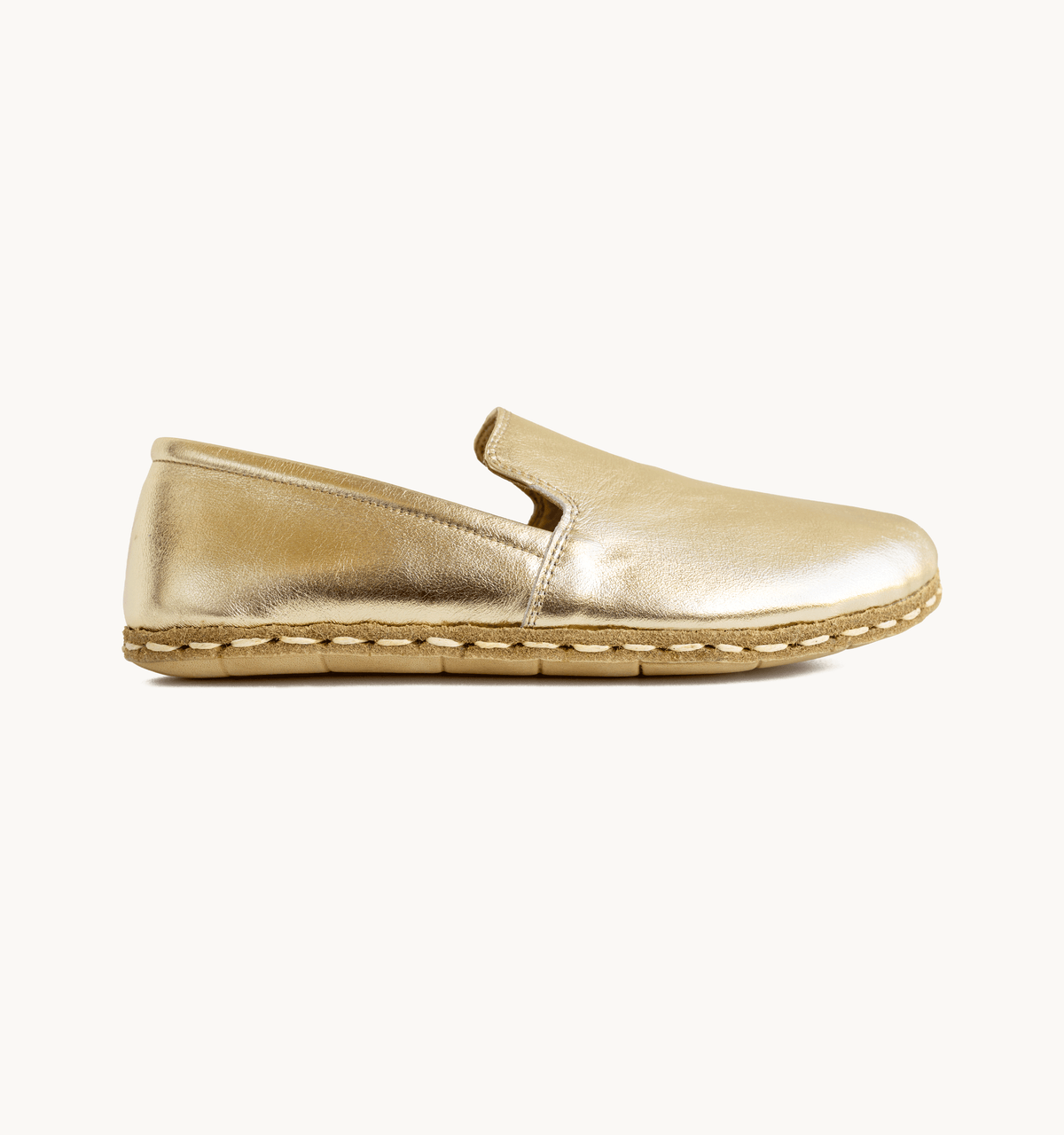 Harvest Gold women's barefoot leather loafer, side view — hand-stitched, zero drop