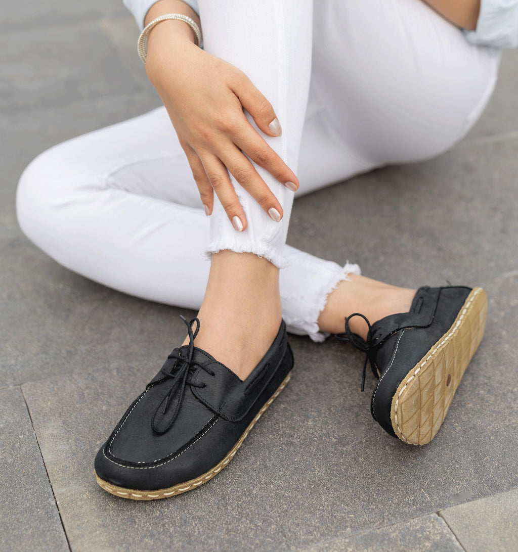 Raven Black women's barefoot boat shoe — smooth full-grain calfskin upper, hand-cut