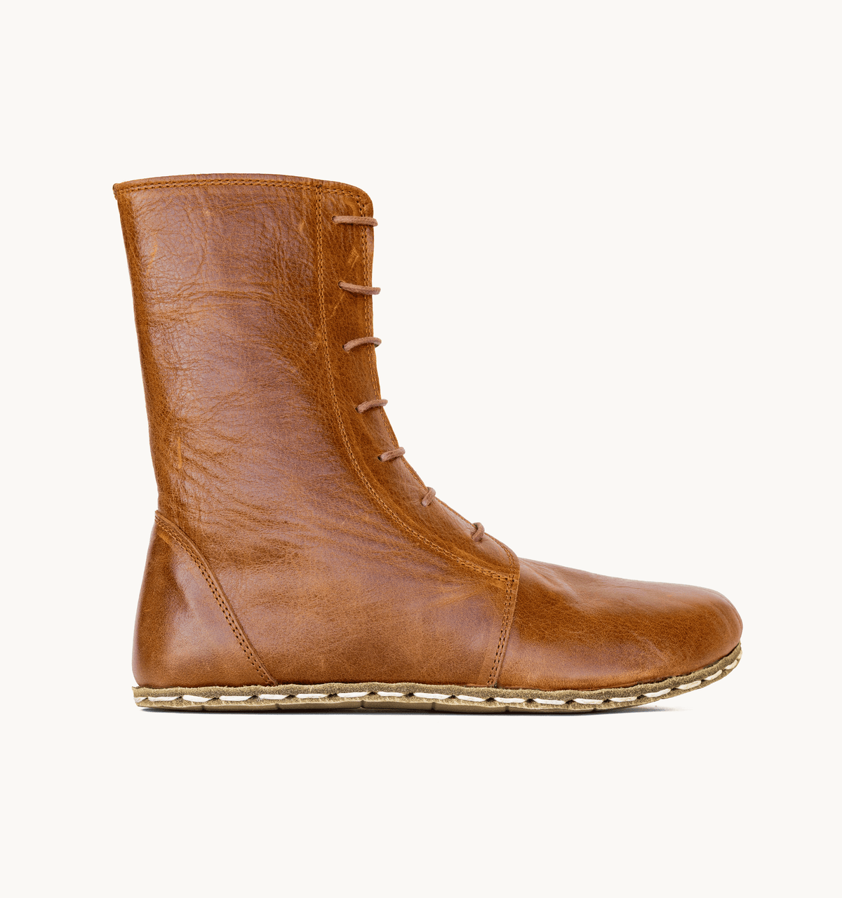 Russet women's barefoot leather ankle boot, side view — hand-stitched, zero drop