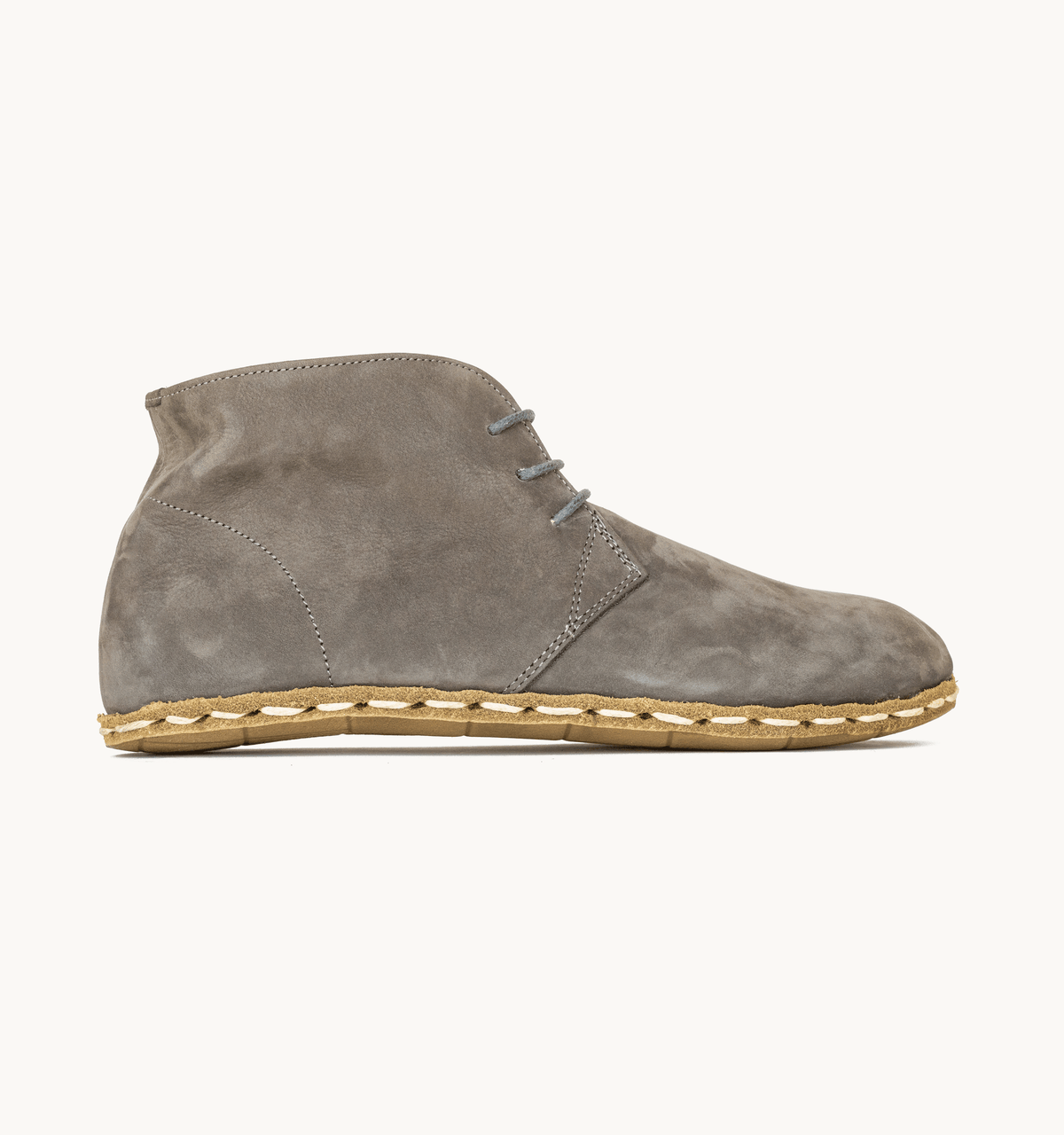Ashen men's barefoot leather chukka boot, side view — hand-stitched, zero drop