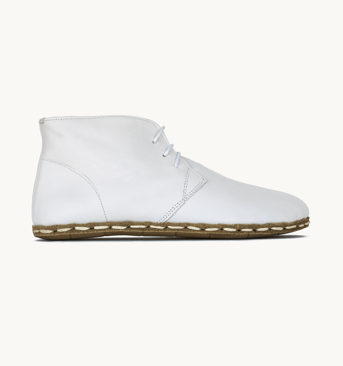 Cloud women's barefoot leather chukka boot, side view — hand-stitched, zero drop