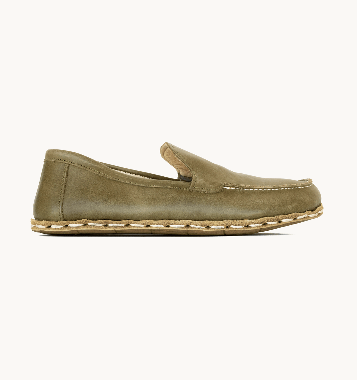 Olive women's barefoot leather moccasin, side view — hand-stitched, zero drop