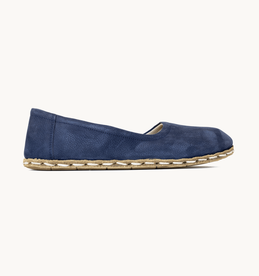 Navy women's barefoot leather ballet flat, side view — hand-stitched, zero drop
