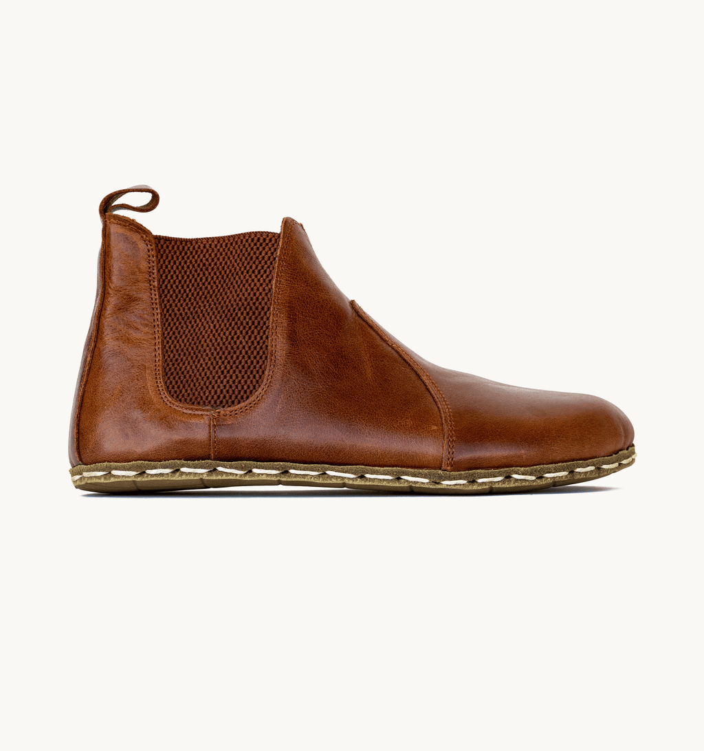Russet women's barefoot leather chelsea boot, side view — hand-stitched, zero drop
