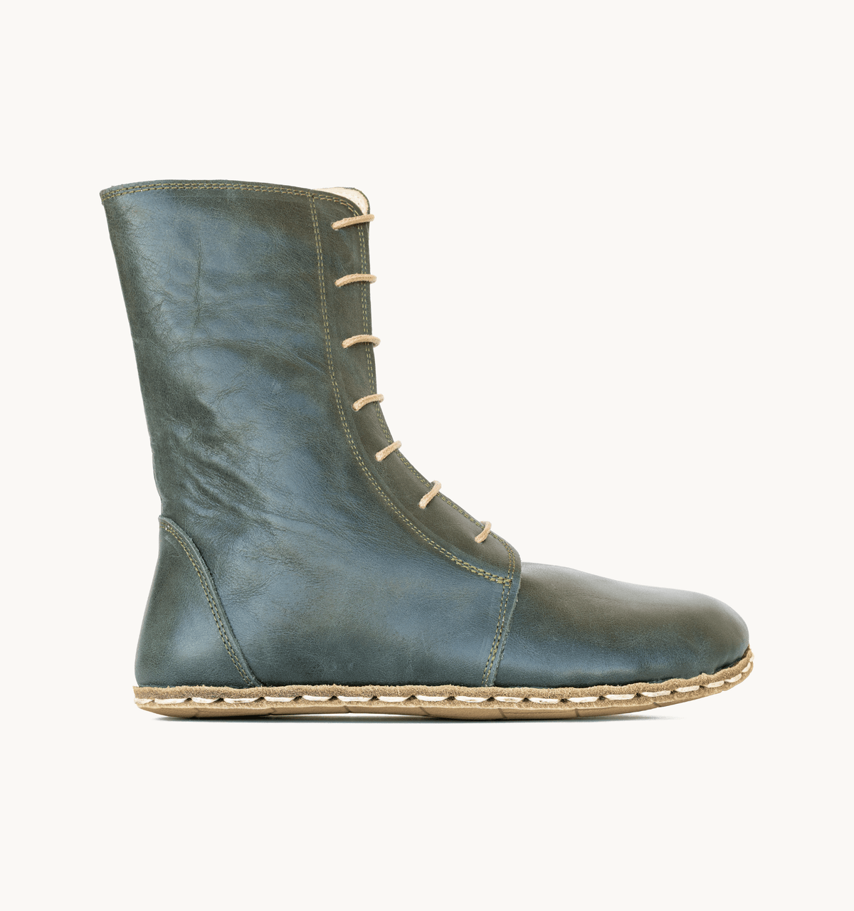Evergreen women's barefoot leather ankle boot, side view — hand-stitched, zero drop