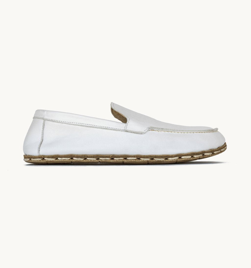 Cloud women's barefoot leather moccasin, side view — hand-stitched, zero drop
