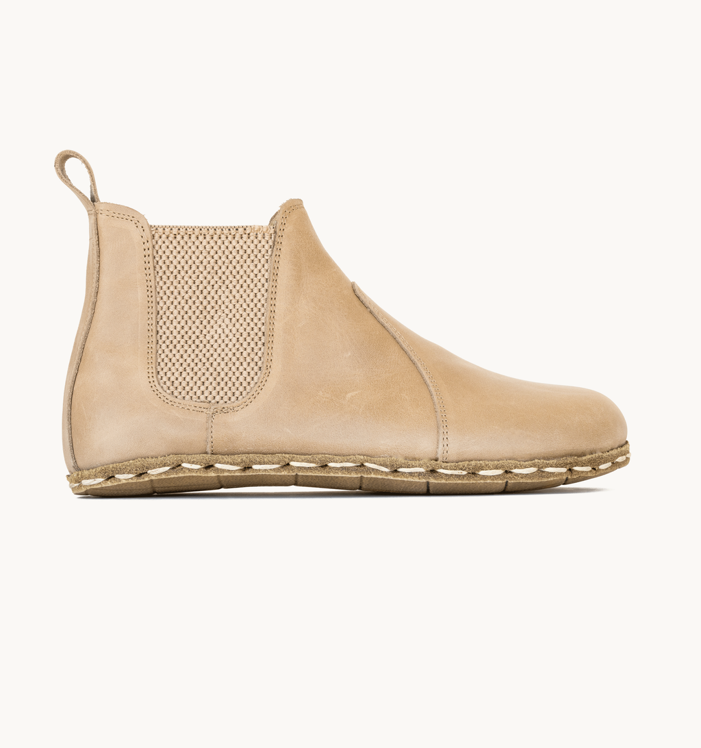 Sand women's barefoot leather chelsea boot, side view — hand-stitched, zero drop