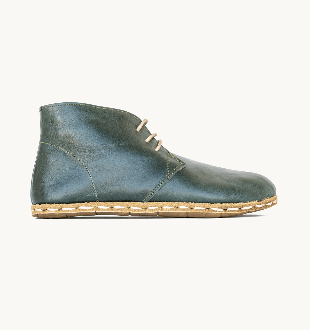 Evergreen women's barefoot leather chukka boot, side view — hand-stitched, zero drop