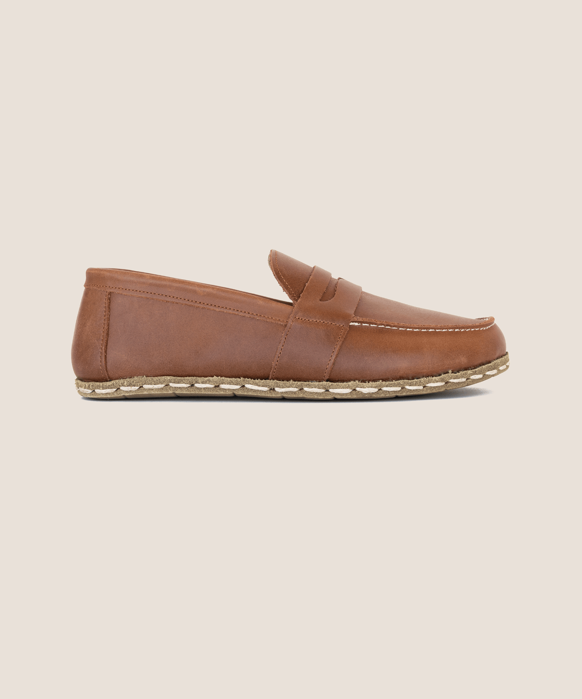 Umber women's barefoot leather penny loafer, side view — hand-stitched, zero drop