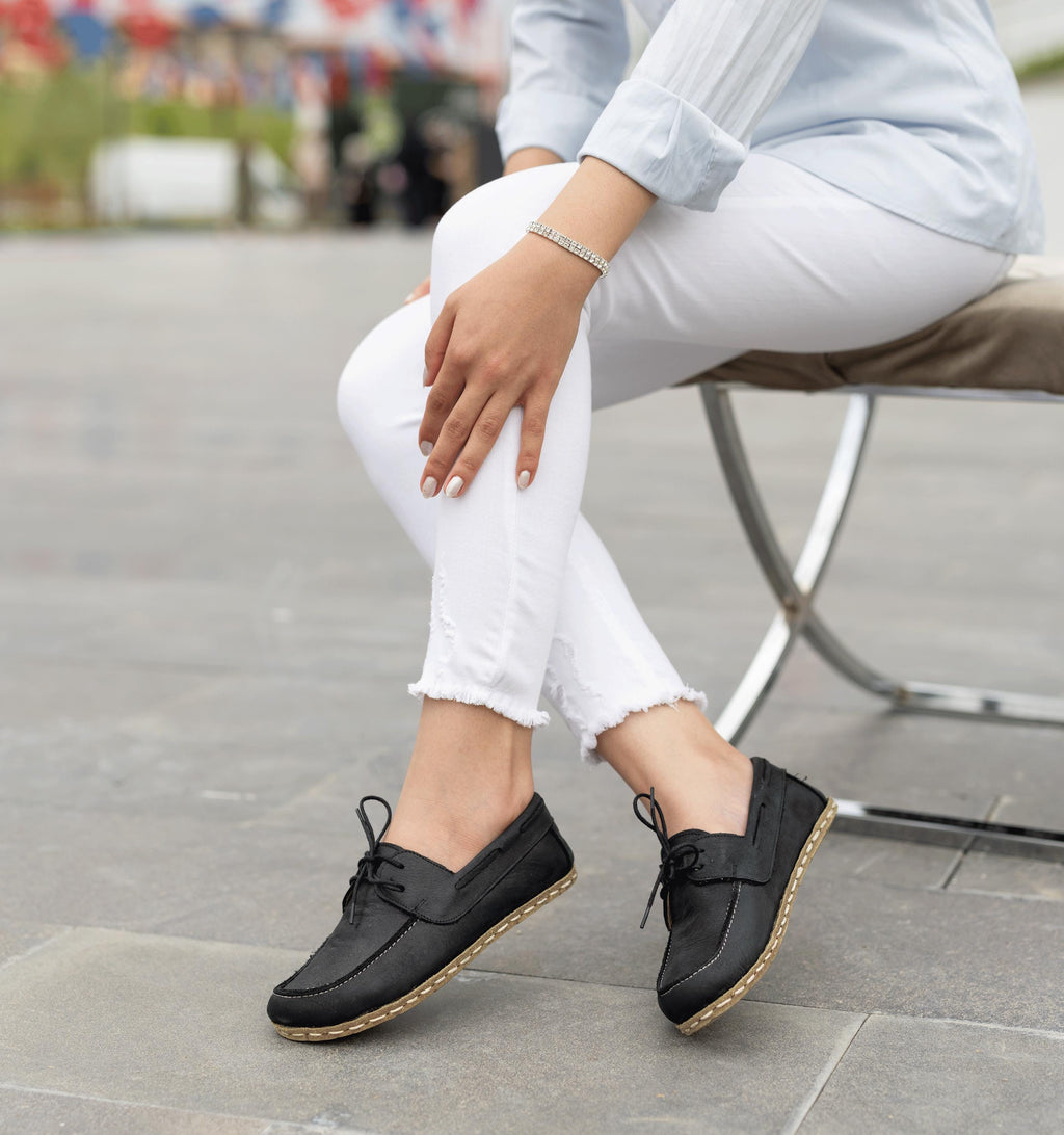 Raven Black barefoot boat shoe for women — buffalo leather sole with copper grounding rivet