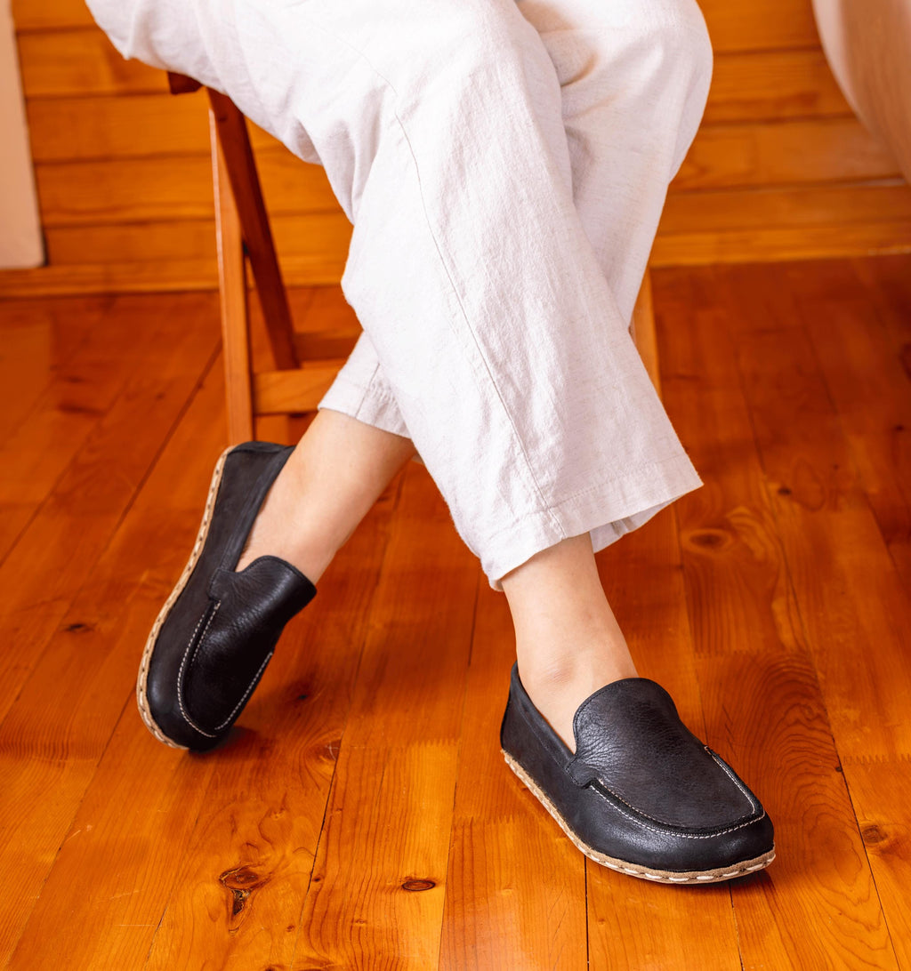 Raven Black women's barefoot moccasin — smooth full-grain calfskin upper, hand-cut