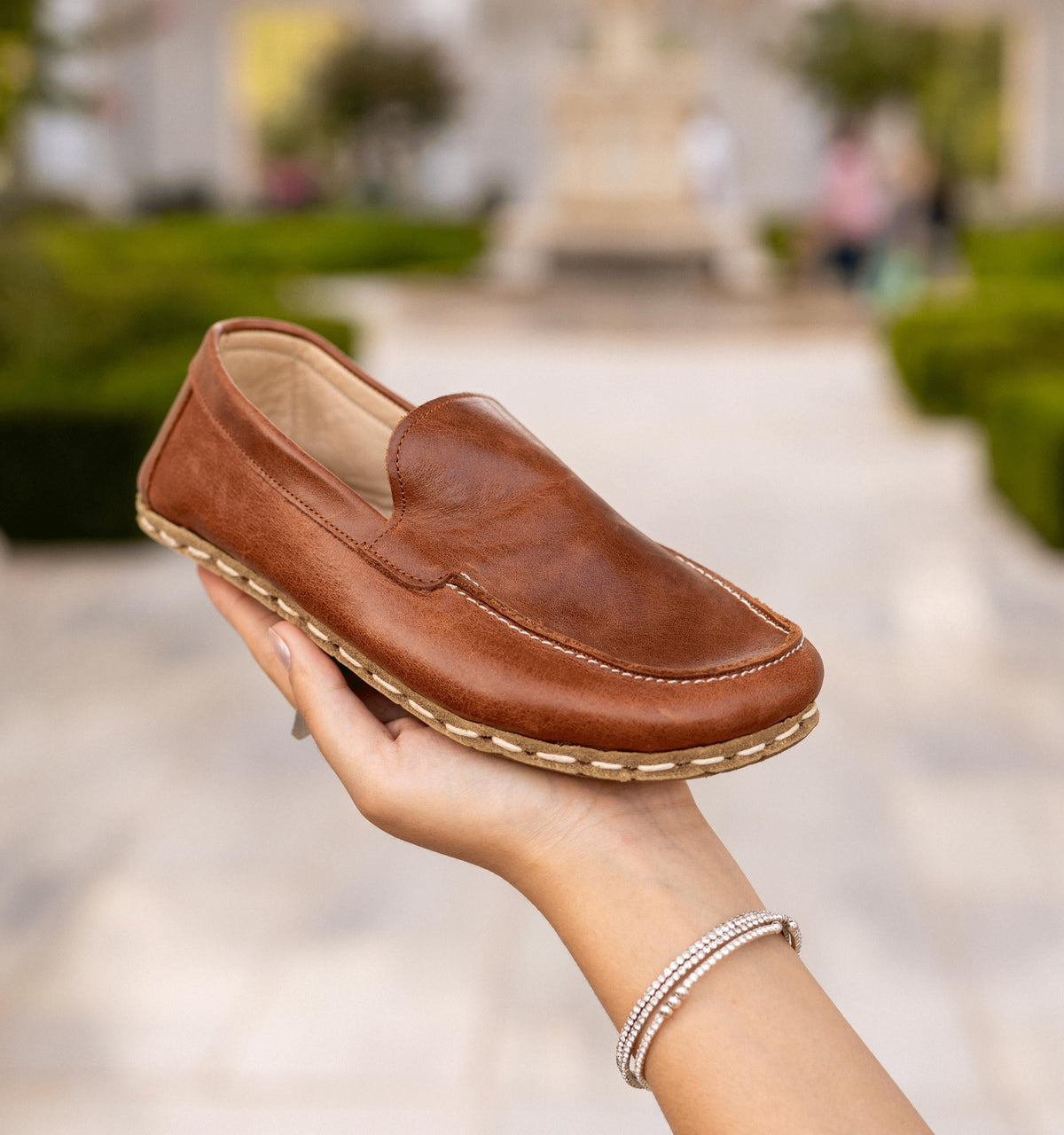 Russet barefoot moccasin for women — buffalo leather sole with copper grounding rivet